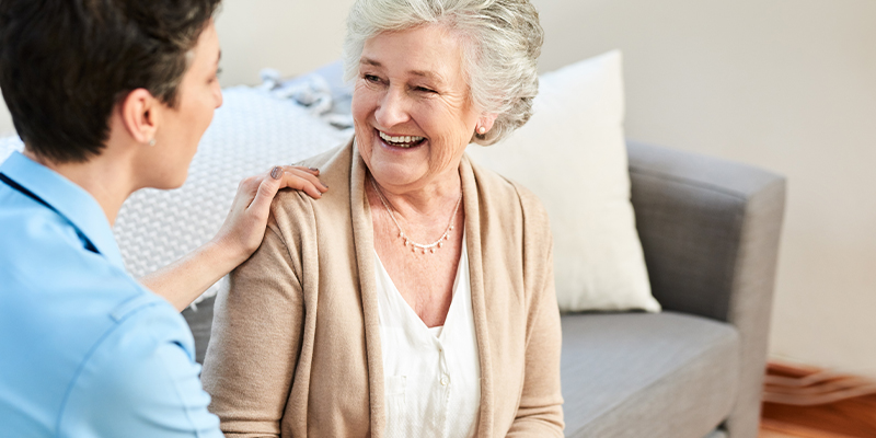 a man and a woman looking at the camera
